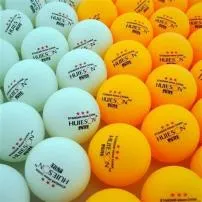 What is the difference between orange and white ping pong balls?