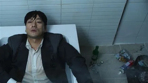 What was sang-woo doing in the bathtub squid game