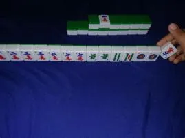 How do you know what to discard in mahjong?