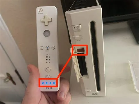 How do you sync two wii remotes