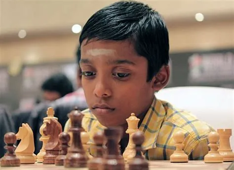 Who is the youngest player to reach a 2000 rating in chess