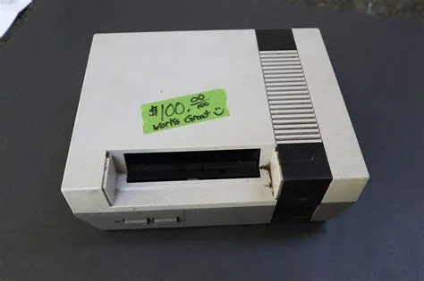 How much did the nes sell for in 1985