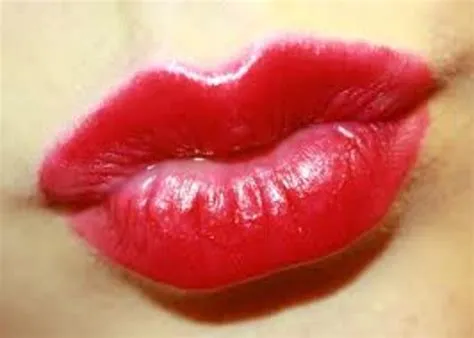 How do you kiss with lips