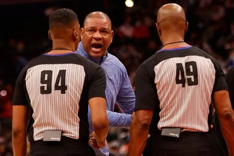 Do nba refs fly first class