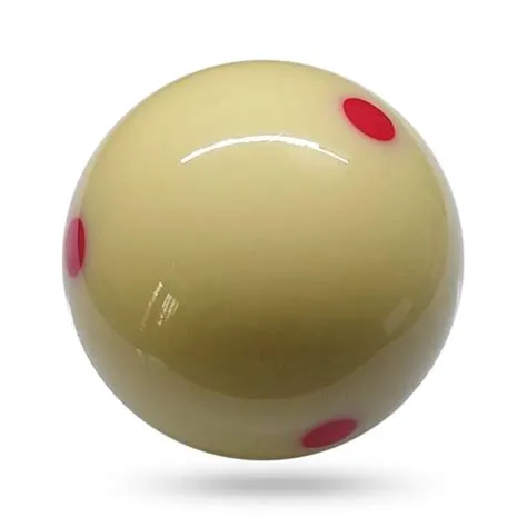 Why do cue balls turn yellow