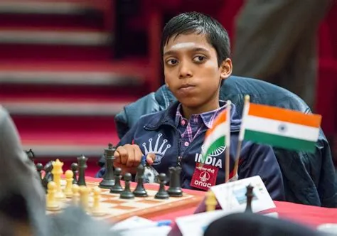 Who is the youngest to reach 2700 in chess