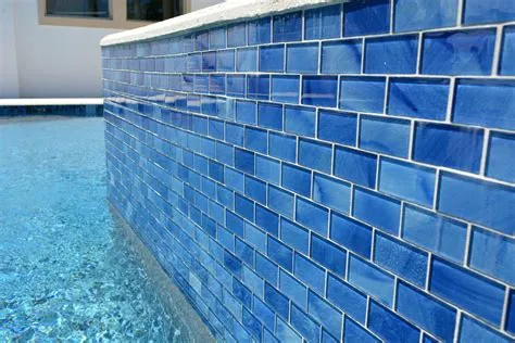 Why do pools use blue tiles