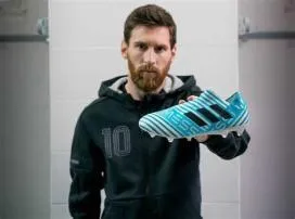 Is messi adidas or nike?